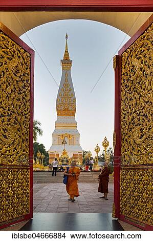 Decorated entrance gate to the Chedi of Wat Phra That Phanom, temple complex in Amphoe That Phanom, Nakhon Phanom Province, Isan, Thailand, Asia View Large Photo Image Picture - Decorated entrance gate to the Chedi of Wat Phra That Phanom, temple complex in Amphoe That Phanom, Nakhon Phanom Province, Isan, Thailand, Asia. Fotosearch