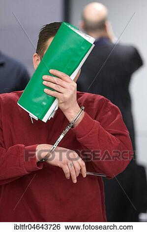 Defendant enters the courtroom in handcuffs, face covered, trial for the raid on a postal agency in Koblenz, Koblenz District Court, Rhineland-Palatinate, Germany, Europe View Large Photo Image Stock Photograph - Defendant enters the courtroom in handcuffs, face covered, trial for the raid on a postal agency in Koblenz, Koblenz District Court, Rhineland-Palatinate, Germany, Europe. Fotosearch