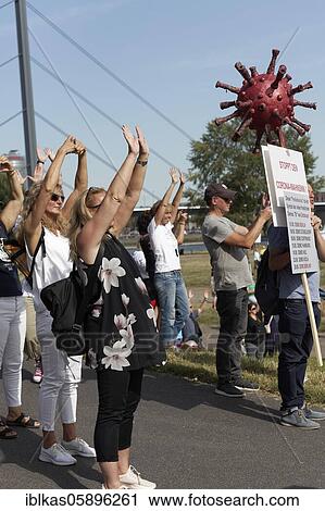 Stock Image - Demo against Corona rules on the Rhine meadows, Corona rebels and lateral thinkers, Düsseldorf, North Rhine-Westphalia, Germany, Europe. Fotosearch