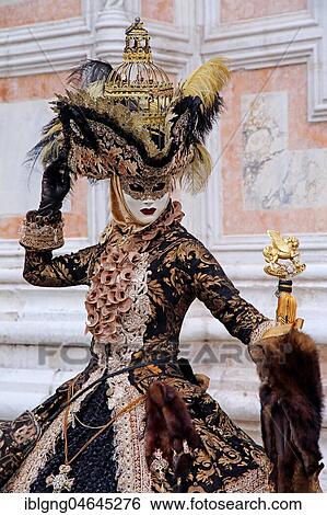 Disguised woman with Venetian mask, Carnival in Venice, Italy, Europe View Large Photo Image Stock Photograph - Disguised woman with Venetian mask, Carnival in Venice, Italy, Europe. Fotosearch