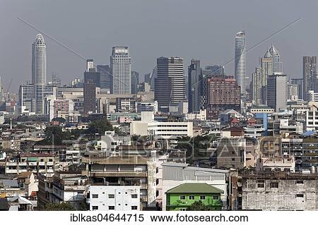 District Pom Prap Sattru Phai and Skyline Siam Square, view from Golden Mountain, Bangkok, Thailand, Asia View Large Photo Image Stock Photography - District Pom Prap Sattru Phai and Skyline Siam Square, view from Golden Mountain, Bangkok, Thailand, Asia. Fotosearch