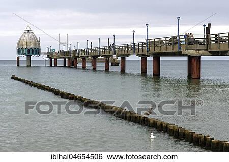 Diving gondola and pier in Zingst, Fischland-Darß-Zingst, Western Pomerania Lagoon Area National Park, Mecklenburg-Western Pomerania, Germany, Europe View Large Photo Image Stock Photograph - Diving gondola and pier in Zingst, Fischland-Darß-Zingst, Western Pomerania Lagoon Area National Park, Mecklenburg-Western Pomerania, Germany, Europe. Fotosearch