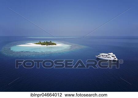 Diving safari ship MS Keana anchors off uninhabited palm island, Ari Atoll, Indian Ocean, Maldives, Asia View Large Photo Image Stock Image - Diving safari ship MS Keana anchors off uninhabited palm island, Ari Atoll, Indian Ocean, Maldives, Asia. Fotosearch