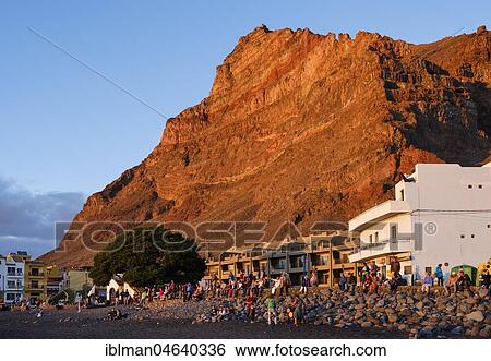 Drummers on the beach in the evening light, La Playa, La Merica mountain, Valle Gran Rey, La Gomera, Canary Islands, Spain, Europe View Large Photo Image Stock Photograph - Drummers on the beach in the evening light, La Playa, La Merica mountain, Valle Gran Rey, La Gomera, Canary Islands, Spain, Europe. Fotosearch