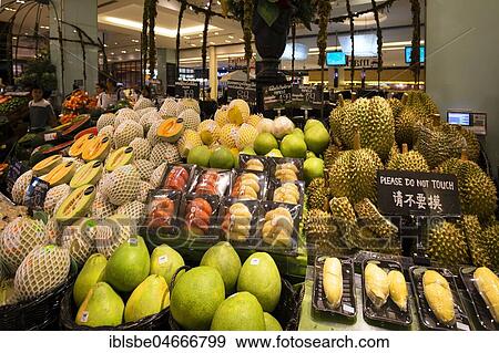Stock Photo - Durian and Mango, fruit on a market stall at the Gourmet Market, Siam Paragon Shopping Centre, Pathum Wan District, Bangkok, Thailand, Asia. Fotosearch