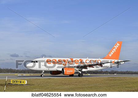EasyJet, Airbus A320, rolling on runway, Munich Airport, Germany, Europe View Large Photo Image Picture - EasyJet, Airbus A320, rolling on runway, Munich Airport, Germany, Europe. Fotosearch