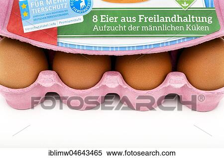 Stock Photography - Eggs from free-range husbandry, pack with identification markings for rearing male chicks, Germany, Europe. Fotosearch