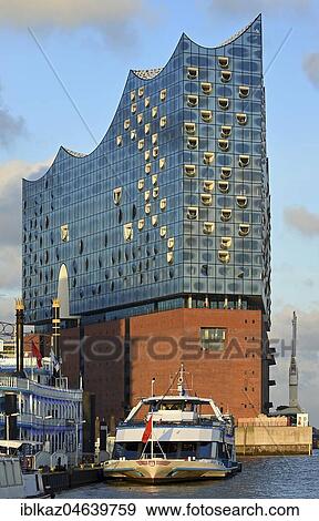 Stock Photo - Elbe Philharmonic Hall in the evening light, architects Herzog & De Meuron, Hafencity, Hamburg, Germany, Europe. Fotosearch