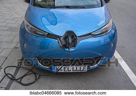 Electric car is charging charging cable, Munich, Bavaria, Germany, Europe View Large Photo Image Stock Photography - Electric car is charging charging cable, Munich, Bavaria, Germany, Europe. Fotosearch