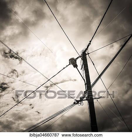 Electric pylon and cloudy sky, Puy de Dome department, Auvergne, France, Europe View Large Photo Image Stock Photo - Electric pylon and cloudy sky, Puy de Dome department, Auvergne, France, Europe. Fotosearch