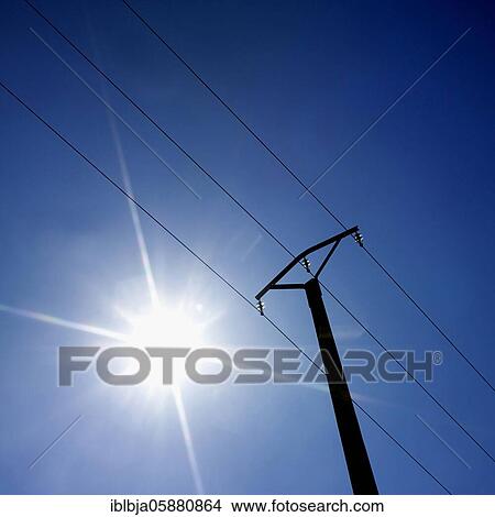Electric pylon on a blue sky, France, Europe View Large Photo Image Picture - Electric pylon on a blue sky, France, Europe. Fotosearch