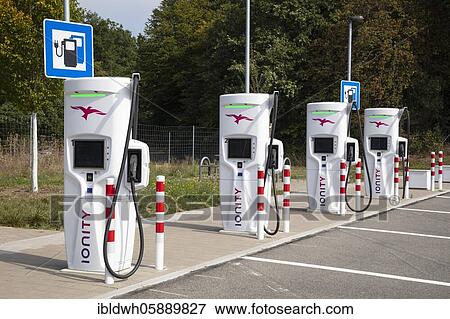 Electricity filling station at a motorway rest area, Hesse, Germany, Europe View Large Photo Image Stock Photo - Electricity filling station at a motorway rest area, Hesse, Germany, Europe. Fotosearch