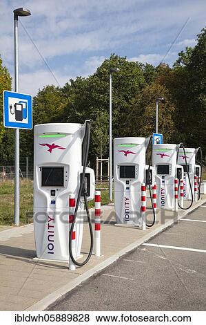Electricity filling station at a motorway rest area, Hesse, Germany, Europe View Large Photo Image Stock Photo - Electricity filling station at a motorway rest area, Hesse, Germany, Europe. Fotosearch