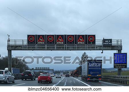 Electronic warning board with speed limit and traffic jam indicator, freeway A9, Bavaria, Germany, Europe View Large Photo Image Stock Image - Electronic warning board with speed limit and traffic jam indicator, freeway A9, Bavaria, Germany, Europe. Fotosearch