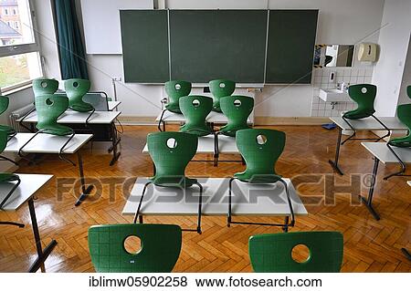 Empty classroom, seated, single tables without distance rule, Corona crisis, Germany, Europe View Large Photo Image Stock Photo - Empty classroom, seated, single tables without distance rule, Corona crisis, Germany, Europe. Fotosearch