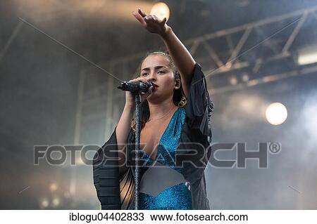 Stock Image - English pop and R&B singer Ella Eyre live at the 26th Heitere Open Air in Zofingen, Aargau, Switzerland, Europe. Fotosearch