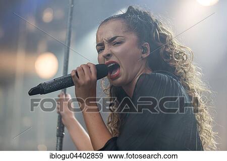 English pop and R&B singer Ella Eyre live at the 26th Heitere Open Air in Zofingen, Aargau, Switzerland, Europe View Large Photo Image Stock Photo - English pop and R&B singer Ella Eyre live at the 26th Heitere Open Air in Zofingen, Aargau, Switzerland, Europe. Fotosearch