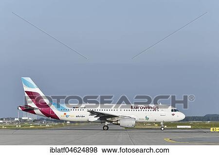 Stock Photo - Eurowings, Airbus A320, runway, Munich Airport, Germany, Europe. Fotosearch