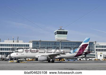 Stock Photo - Eurowings, Airbus A320, towed by Push Back Truck, Munich Airport, Germany, Europe. Fotosearch