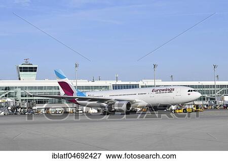 Eurowings, Airbus, A330 with Push Back Truck, Munich Airport, Upper Bavaria, Bavaria, Germany, Europe View Large Photo Image Stock Photo - Eurowings, Airbus, A330 with Push Back Truck, Munich Airport, Upper Bavaria, Bavaria, Germany, Europe. Fotosearch