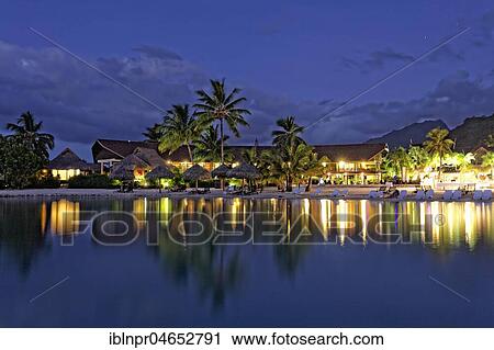 Evening hotel complex, Luxury hotel, Interconti Resort, Moorea, Society islands, Leeward islands, Pacific Ocean, French Polynesia, Oceania View Large Photo Image Stock Image - Evening hotel complex, Luxury hotel, Interconti Resort, Moorea, Society islands, Leeward islands, Pacific Ocean, French Polynesia, Oceania. Fotosearch