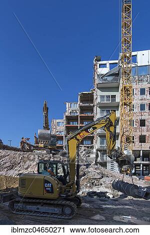 Excavator at demolition work, administration building of the former main post office, Nuremberg, Middle Franconia, Bavaria, Germany, Europe View Large Photo Image Stock Image - Excavator at demolition work, administration building of the former main post office, Nuremberg, Middle Franconia, Bavaria, Germany, Europe. Fotosearch