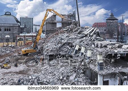 Excavator in building rubble during demolition of a building, Nuremberg, Middle Franconia, Bavaria, Germany, Europe View Large Photo Image Stock Photo - Excavator in building rubble during demolition of a building, Nuremberg, Middle Franconia, Bavaria, Germany, Europe. Fotosearch