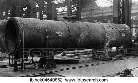 Stock Image - Factory hall, steel industry, mechanical engineering, boiler of a locomotive, 1910s, Borsigwerke, Berlin Tegel, Germany, Europe. Fotosearch