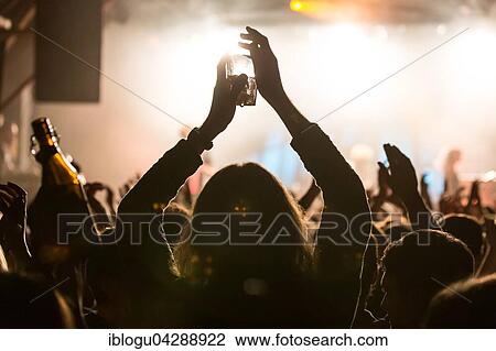 Fans, alcohol, concertgoers at the concert of the British indie rock band The Subways live in the Schüür Lucerne, Switzerland, Europe View Large Photo Image Stock Image - Fans, alcohol, concertgoers at the concert of the British indie rock band The Subways live in the Schüür Lucerne, Switzerland, Europe. Fotosearch