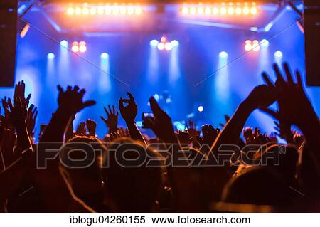 Fans in the audience cheering during the concert of the German-Lebanese rapper MoTrip live at the Schüür, Lucerne, Switzerland, Europe View Large Photo Image Stock Photography - Fans in the audience cheering during the concert of the German-Lebanese rapper MoTrip live at the Schüür, Lucerne, Switzerland, Europe. Fotosearch