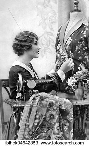Stock Image - Fashion designer, tailor with sewing machine, 1910s, Germany, Europe. Fotosearch