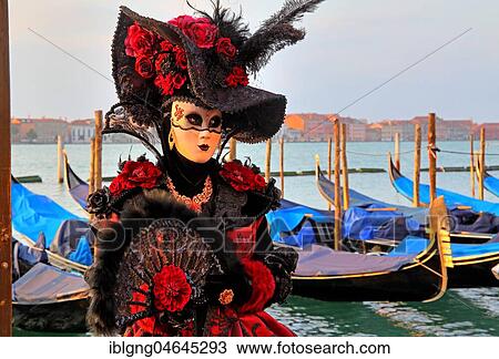 Female disguised with Venetian mask on the lagoon, Carnival in Venice, Italy, Europe View Large Photo Image Stock Image - Female disguised with Venetian mask on the lagoon, Carnival in Venice, Italy, Europe. Fotosearch