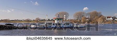 Ferry on the Rhine between Düsseldorf-Kaiserwerth and Meerbusch Langst-Kierst, North Rhine-Westphalia, Germany, Europe View Large Photo Image Stock Photography - Ferry on the Rhine between Düsseldorf-Kaiserwerth and Meerbusch Langst-Kierst, North Rhine-Westphalia, Germany, Europe. Fotosearch