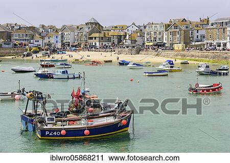 Fishing boats in the picturesque port of St Ives, Cornwall, United Kingdom, Europe View Large Photo Image Stock Image - Fishing boats in the picturesque port of St Ives, Cornwall, United Kingdom, Europe. Fotosearch