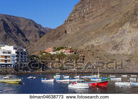 Fishing boats in the port, Vueltas, Valle Gran Rey, La Gomera, Canary Islands, Spain, Europe View Large Photo Image Stock Image - Fishing boats in the port, Vueltas, Valle Gran Rey, La Gomera, Canary Islands, Spain, Europe. Fotosearch