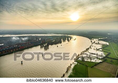 Stock Image - Flood on Rhine, near Duisburg, Ruhr Area, North Rhine-Westphalia, Germany, Europe. Fotosearch