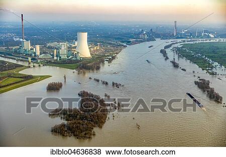 Stock Photo - Flood on Rhine with Walsum power plant, near Duisburg, Ruhr Area, North Rhine-Westphalia, Germany, Europe. Fotosearch