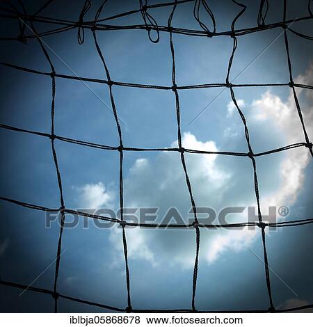 Football goal net against cloudy sky, France, Europe View Large Photo Image Stock Photo - Football goal net against cloudy sky, France, Europe. Fotosearch