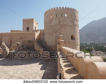 Fortress Nakhl with round tower and battlements, Nakhl, Oman, Asia View Large Photo Image Stock Image - Fortress Nakhl with round tower and battlements, Nakhl, Oman, Asia. Fotosearch