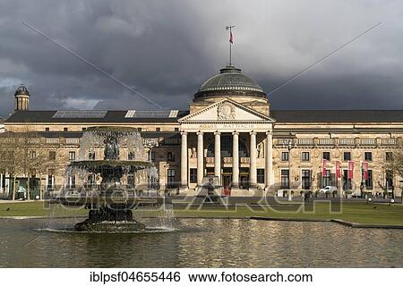 Stock Photograph - Fountain in front of the spa hotel and Casino, Wiesbaden, Hesse, Germany, Europe. Fotosearch