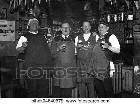 Four men drink beer in a pub, 1920s, exact place unknown, Germany, Europe View Large Photo Image Stock Photo - Four men drink beer in a pub, 1920s, exact place unknown, Germany, Europe. Fotosearch
