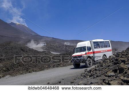 Four-wheel drive vehicles on gravel road to Etna volcano, province of Catania, Silzilia, Italy, Europe View Large Photo Image Stock Photo - Four-wheel drive vehicles on gravel road to Etna volcano, province of Catania, Silzilia, Italy, Europe. Fotosearch