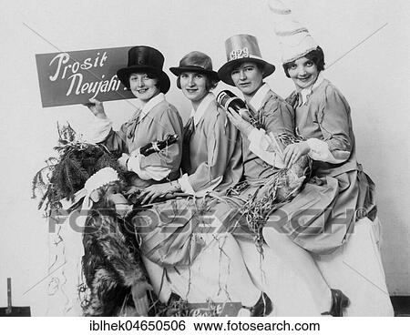 Four women celebrate New Year's Eve, 1929, 1920s, Germany, Europe View Large Photo Image Stock Photograph - Four women celebrate New Year's Eve, 1929, 1920s, Germany, Europe. Fotosearch