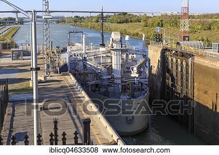 Freighter leaves lock 3, Welland Canal, St. Catharines, Ontario, Canada, North America View Large Photo Image Stock Photo - Freighter leaves lock 3, Welland Canal, St. Catharines, Ontario, Canada, North America. Fotosearch