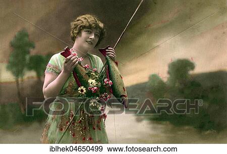 Stock Photo - French card for 1st of April, woman with two fish, 1920s, France, Europe. Fotosearch