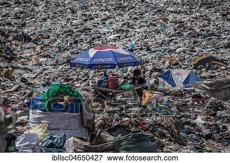 Garbage collectors on rubbish dump on the outskirts, Phnom Penh, Cambodia, Asia View Large Photo Image Stock Photo - Garbage collectors on rubbish dump on the outskirts, Phnom Penh, Cambodia, Asia. Fotosearch
