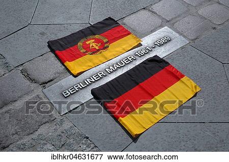 GDR and Germany flag next to the marking of the historical course of the Berlin Wall, Bernauer Straße, Prenzlauer Berg/Wedding, Berlin, Germany, Europe View Large Photo Image Stock Photo - GDR and Germany flag next to the marking of the historical course of the Berlin Wall, Bernauer Straße, Prenzlauer Berg/Wedding, Berlin, Germany, Europe. Fotosearch