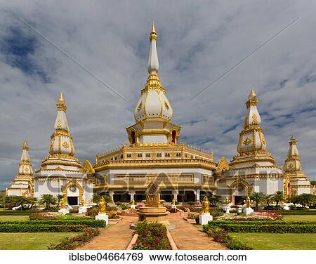 Gilded 101m high Phra Maha Chedi Chai Mongkhon Pagoda, Lotus Fountain, Wat Pha Nam Yoi Temple, Phuttha-Utthayan Park, Province Roi Et, Isan, Northeast, Thailand, Asia View Large Photo Image Stock Photo - Gilded 101m high Phra Maha Chedi Chai Mongkhon Pagoda, Lotus Fountain, Wat Pha Nam Yoi Temple, Phuttha-Utthayan Park, Province Roi Et, Isan, Northeast, Thailand, Asia. Fotosearch