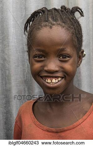 Stock Image - Girl about 8 years, portrait, Ari tribe, Southern Nations Nationalities and Peoples' Region, Ethiopia, Africa. Fotosearch