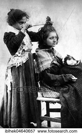 Girl hairdressing her girlfriend, 1920s, Naples, Italy, Europe View Large Photo Image Stock Photo - Girl hairdressing her girlfriend, 1920s, Naples, Italy, Europe. Fotosearch